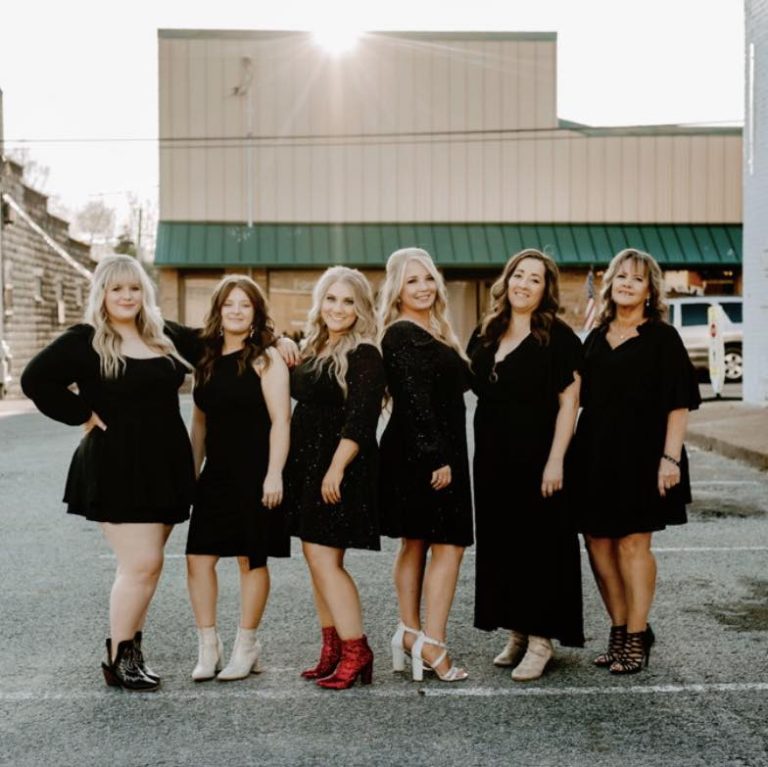 Group of women in black dresses